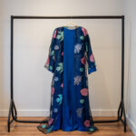 Autumn Bloom abaya in Royal Blue – front view on hanger