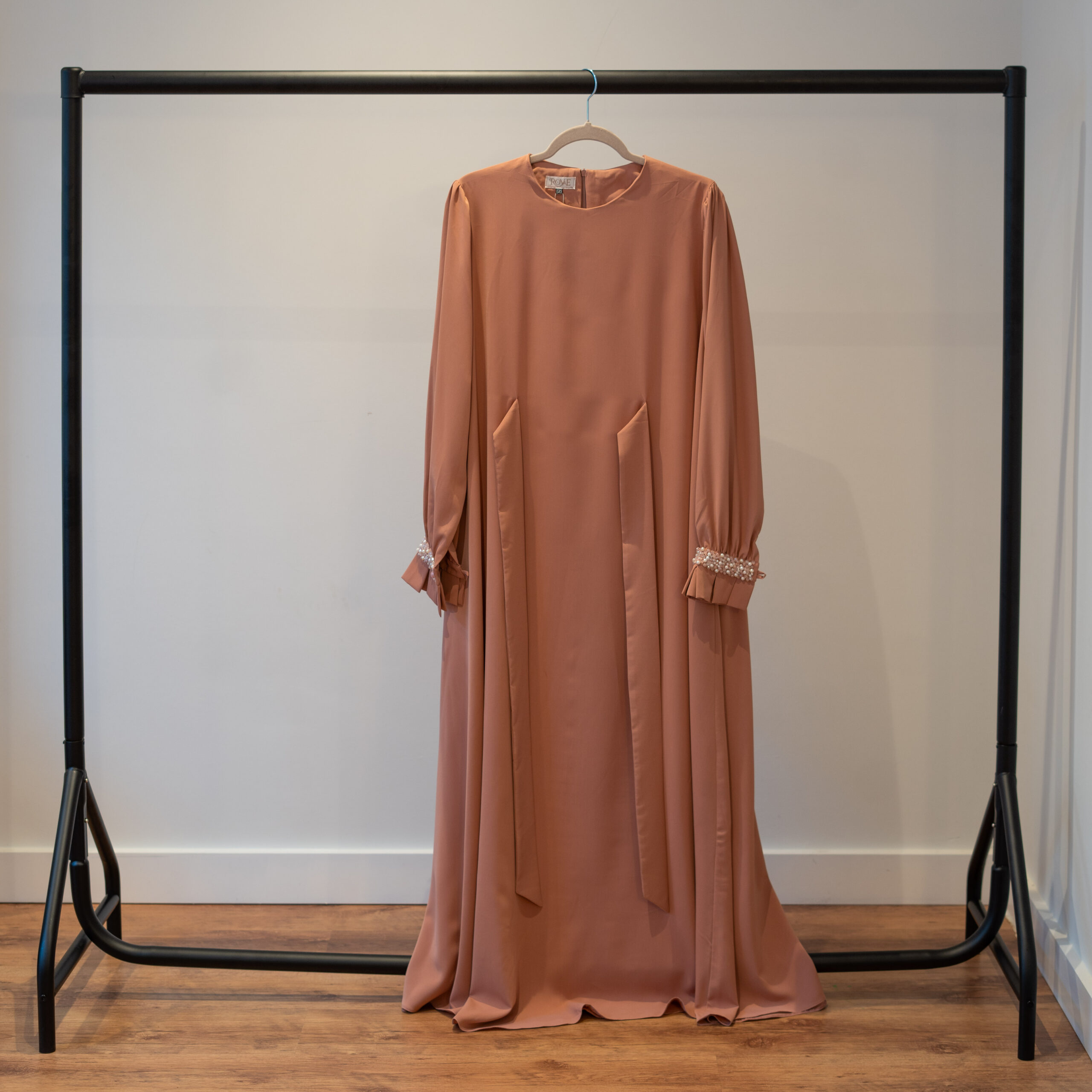 Nova kimono-style long dress in nude – full front view on hanger”