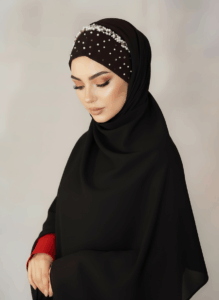 Black Pearl Tuck-In Hijab with handcrafted beaded details, worn by a model.