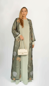 Autumn Bloom embroidered abaya in Pistachio Green – worn on model, full front view