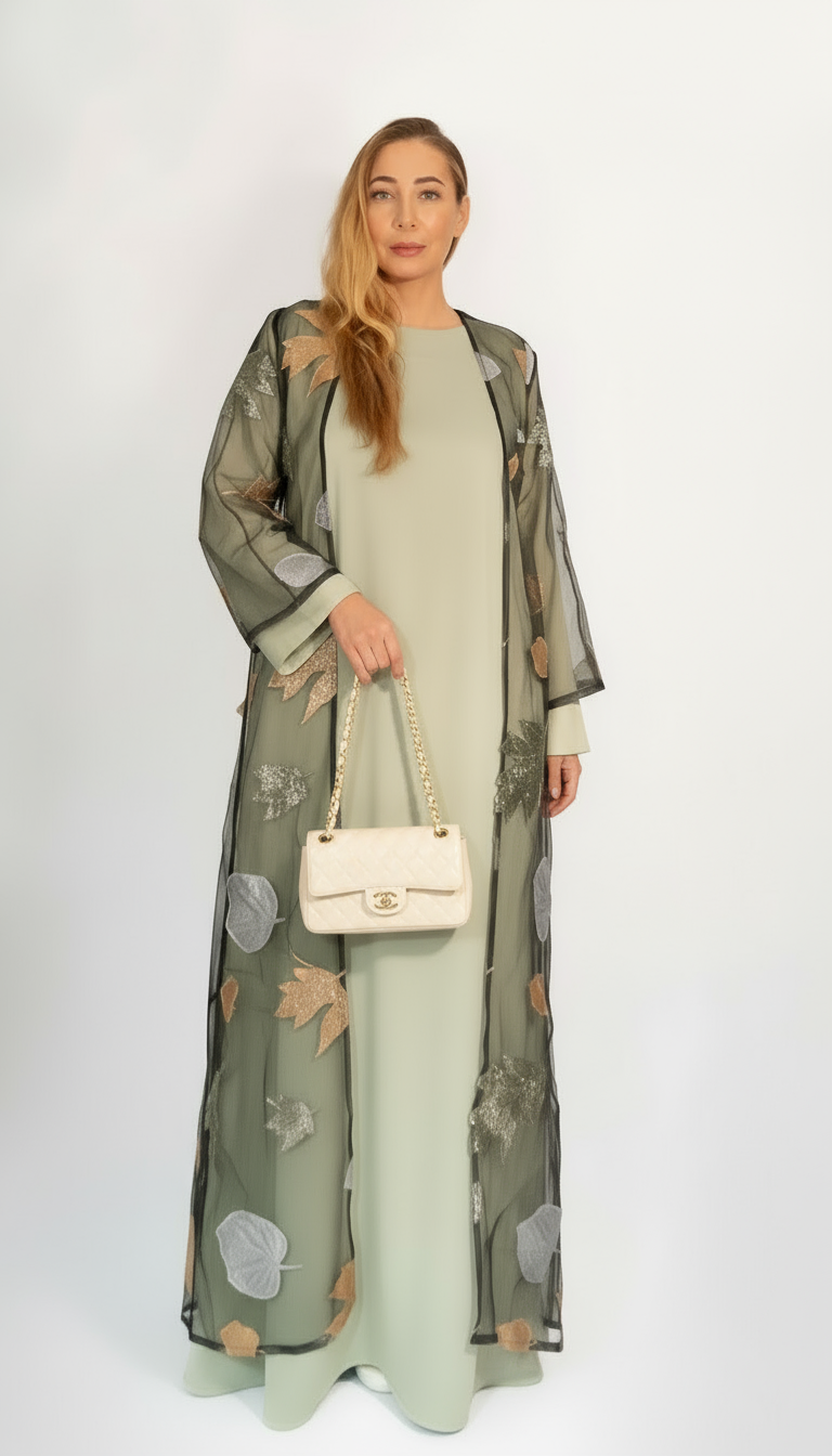 Autumn Bloom embroidered abaya in Pistachio Green – worn on model, full front view