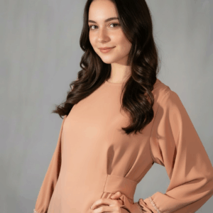 Nova kimono-style long dress in nude — model wearing the dress with hand-beaded sleeve details