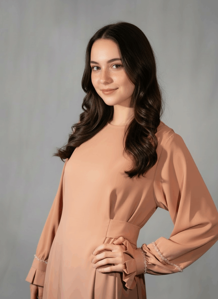 Nova kimono-style long dress in nude — model wearing the dress with hand-beaded sleeve details