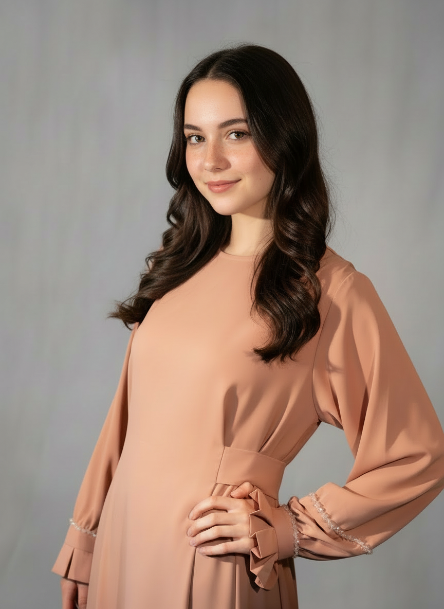 Nova kimono-style long dress in nude — model wearing the dress with hand-beaded sleeve details