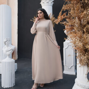 Elegant long-sleeve maxi KImono dress in warm beige with a modest high neckline and flowing silhouette.