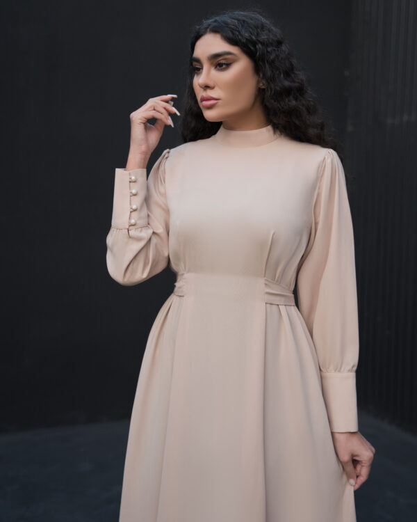 Nova kimono-style long maxi dress in nude with plain cuffs and minimalist silhouette