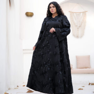 Black abaya with floral textured fabric and flowing silhouette