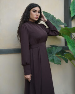 Side view of Nova kimono-style long maxi dress in deep mauve brown with plain cuffs